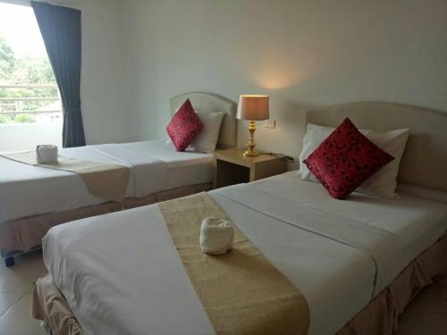 Katil atau katil-katil dalam bilik di โรงแรมเวลลิงตัน