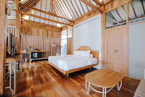 Cama o camas de una habitación en Ayom Java Village Solo