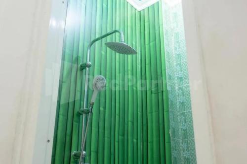 Ванная комната в Homestay Babussalam Rungkut Mitra RedDoorz
