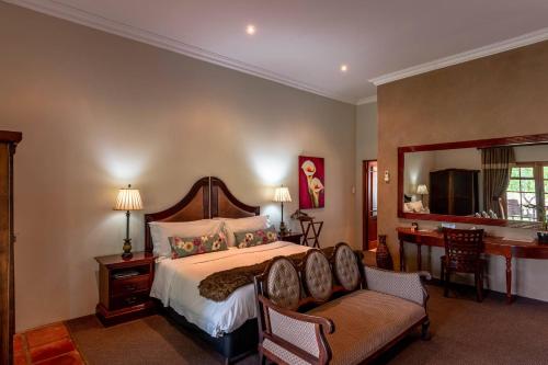 Katil atau katil-katil dalam bilik di Mooiplaas Guesthouse