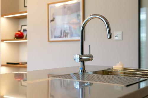 a kitchen sink with a faucet on a counter at VILLA Sasebo Stad #SS1 in Sasebo