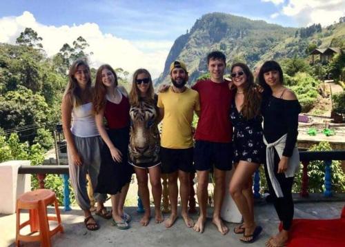 a group of people posing for a picture at Rock View Hostel Ella in Ella
