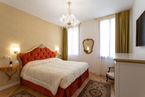 Lova arba lovos apgyvendinimo įstaigoje Cà del Glicine - charming apartment on the canal