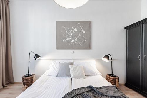 Una cama o camas en una habitación de Hotel Pivoňka