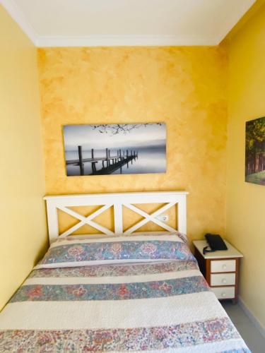 Postel nebo postele na pokoji v ubytování Hostal L'Anfora