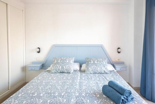 Cama o camas de una habitación en Apartamentos El Velero