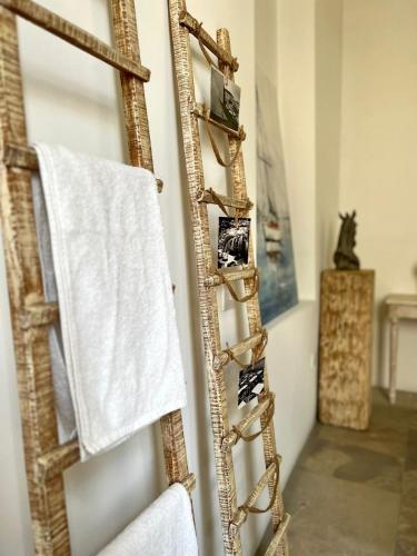 a towel ladder in a bathroom with a towel at The Old Town Heritage House Platform 357 in Nicosia