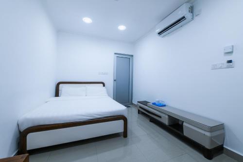 Giường trong phòng chung tại SP Star Hotel