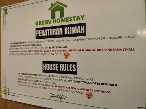 a sign for a green homesasy peruvian pumpkin house rules at Mini Green Homestay in Kulai