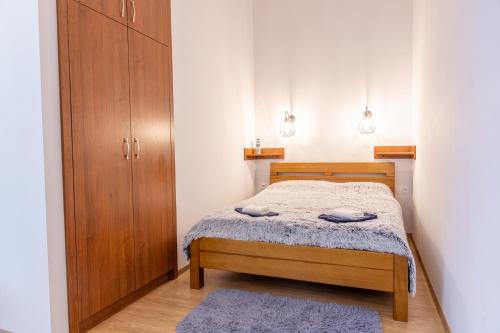 Cama o camas de una habitación en Apartament Piaski