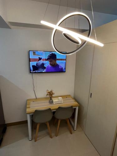 TV a/nebo společenská místnost v ubytování South Residences Tower 3