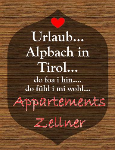 a wooden sign with a heart on it at Appartements Zellner in Alpbach