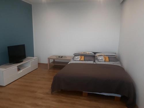 Ein Bett oder Betten in einem Zimmer der Unterkunft Florianihof Sankt Marxen