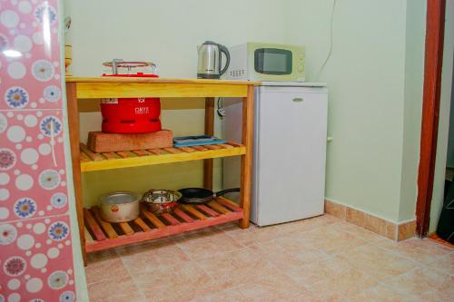 Η κουζίνα ή μικρή κουζίνα στο Zanzibar Spice Nest House