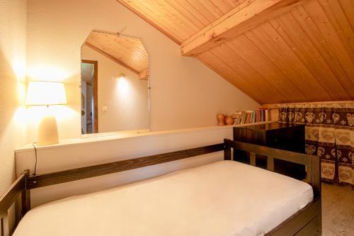 Postel nebo postele na pokoji v ubytování Côté Montagne