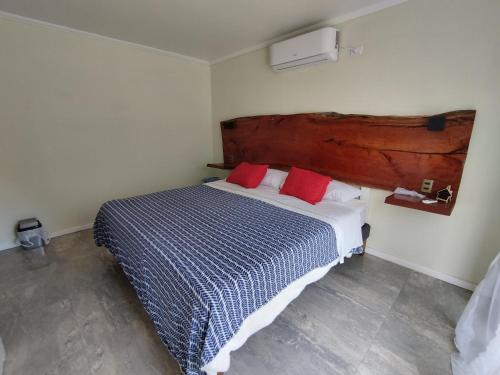 Ένα ή περισσότερα κρεβάτια σε δωμάτιο στο Quinta El Rosal