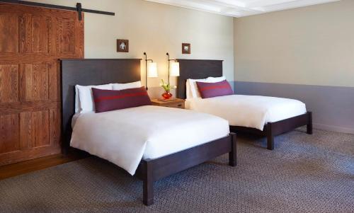 two beds in a hotel room with two beds at The Hollywood Roosevelt in Los Angeles