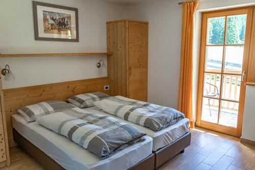 Posteľ alebo postele v izbe v ubytovaní Apartements Precalalt