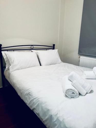 Ein Bett oder Betten in einem Zimmer der Unterkunft Ortansia