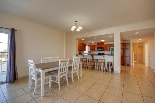 a dining room and kitchen with a table and chairs at Americana Condos 10th street in Ocean City