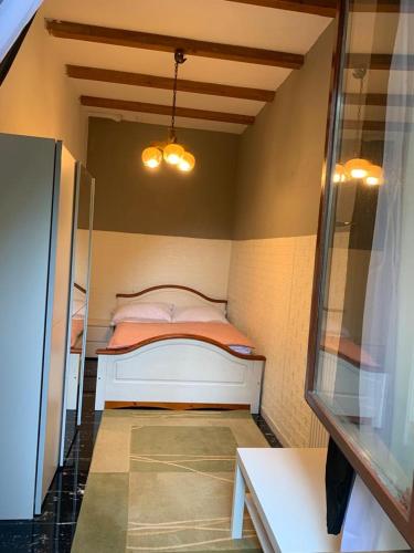 Кровать или кровати в номере Apartment Ariana