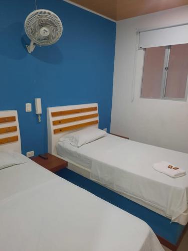Postel nebo postele na pokoji v ubytování HOTEL MAR DEL CARIBE