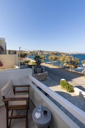 a balcony with a view of the ocean at Vivianna's View in Azolimnos