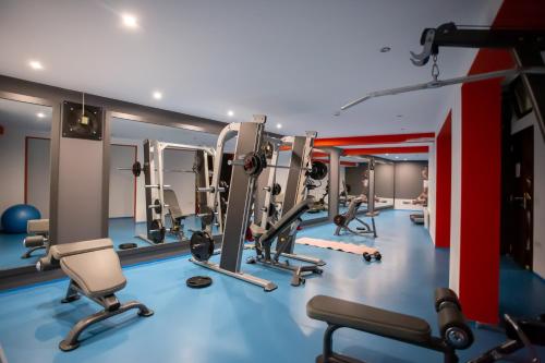 a gym with treadmills and cardio machines at The Dream Getaway & Spa by DeVasco in Becici
