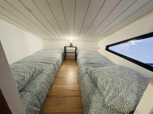 Postel nebo postele na pokoji v ubytování Spa & vue Mer - Les Ô de Bandol