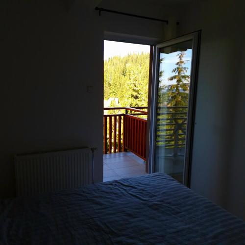 Ένα ή περισσότερα κρεβάτια σε δωμάτιο στο Apartman Crystal Vlašić