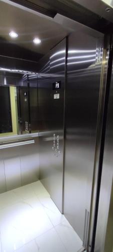 an empty elevator in a room with at Menesse mitdtown2 , AVE 25TH in Playa del Carmen