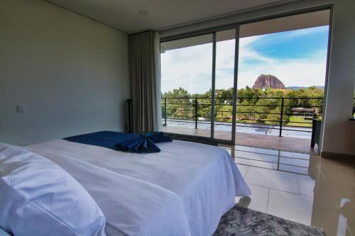 Ένα ή περισσότερα κρεβάτια σε δωμάτιο στο Arvum Hotel Boutique