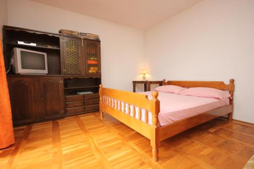 Postel nebo postele na pokoji v ubytování Apartment Opatija 7904a
