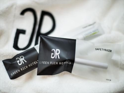 a package of green right horoscopes and a cigarette at Green Rich Hotel Osaka Airport in Ikeda