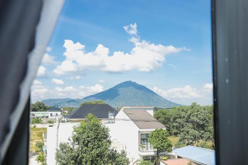 a view from a window of a mountain at Le Phan Hotel in Tây Ninh