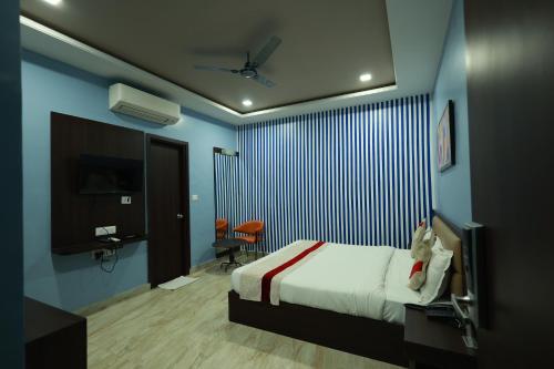 Ένα ή περισσότερα κρεβάτια σε δωμάτιο στο Hotel Jai Harsh