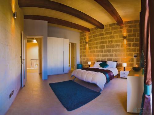 Ένα ή περισσότερα κρεβάτια σε δωμάτιο στο Kampnar Holiday Home