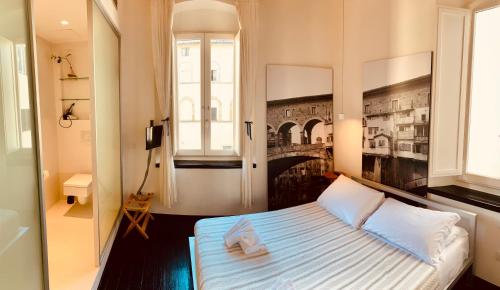 Posteľ alebo postele v izbe v ubytovaní UFFIZI & SANTO SPIRITO Family/Groups Apartment