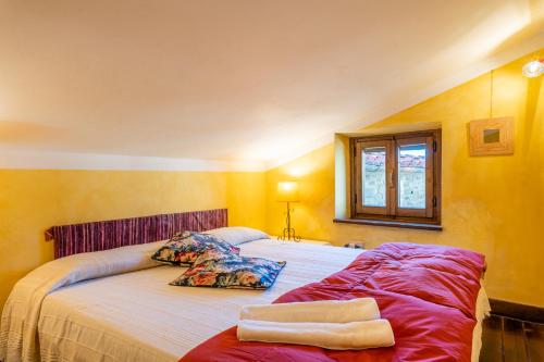 Letto o letti in una camera di Il Belvedere sulla Valle House