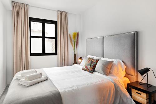 Posteľ alebo postele v izbe v ubytovaní 3 bedroom apartment in the heart of Puerto Banús