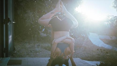 a woman doing a yoga pose in the sun at Monte Do Malhao - Art, Eco & Spa in Castro Marim