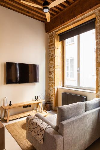 Host Inn Le Lumiere SPA & CINÉMAにあるテレビまたはエンターテインメントセンター
