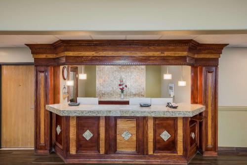 a kitchen with a large wooden island in a room at Best Western Richfield Inn in Richfield