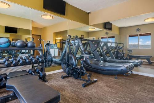 a gym with several tread machines in a room at Best Western Richfield Inn in Richfield