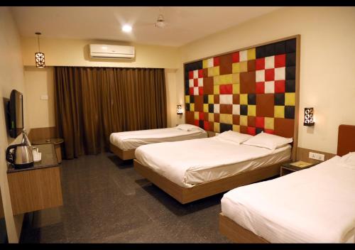 Кровать или кровати в номере Hotel AGC