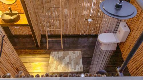 an overhead view of a bathroom with a toilet at African Safari Canvas Lodge Tent Sea View in Kranidi