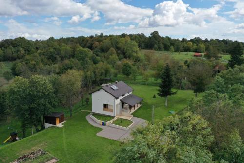 an aerial view of a house in the middle of a field at Villa Diva Grabovčeva in Rakovica