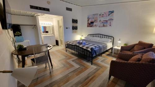 Postel nebo postele na pokoji v ubytování Sussex Motel