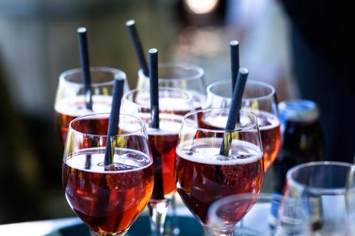a row of wine glasses sitting on a table at Hotel Viktor in Viktorsberg
