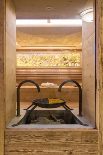 a small room with a table in a window at Hotel Gletscherblick in Sankt Anton am Arlberg